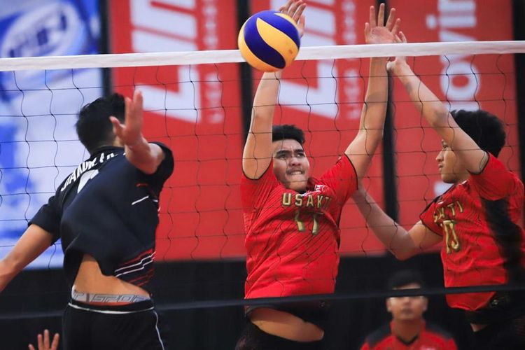 Pertandingan bola voli menggunakan sistem penilaian secara